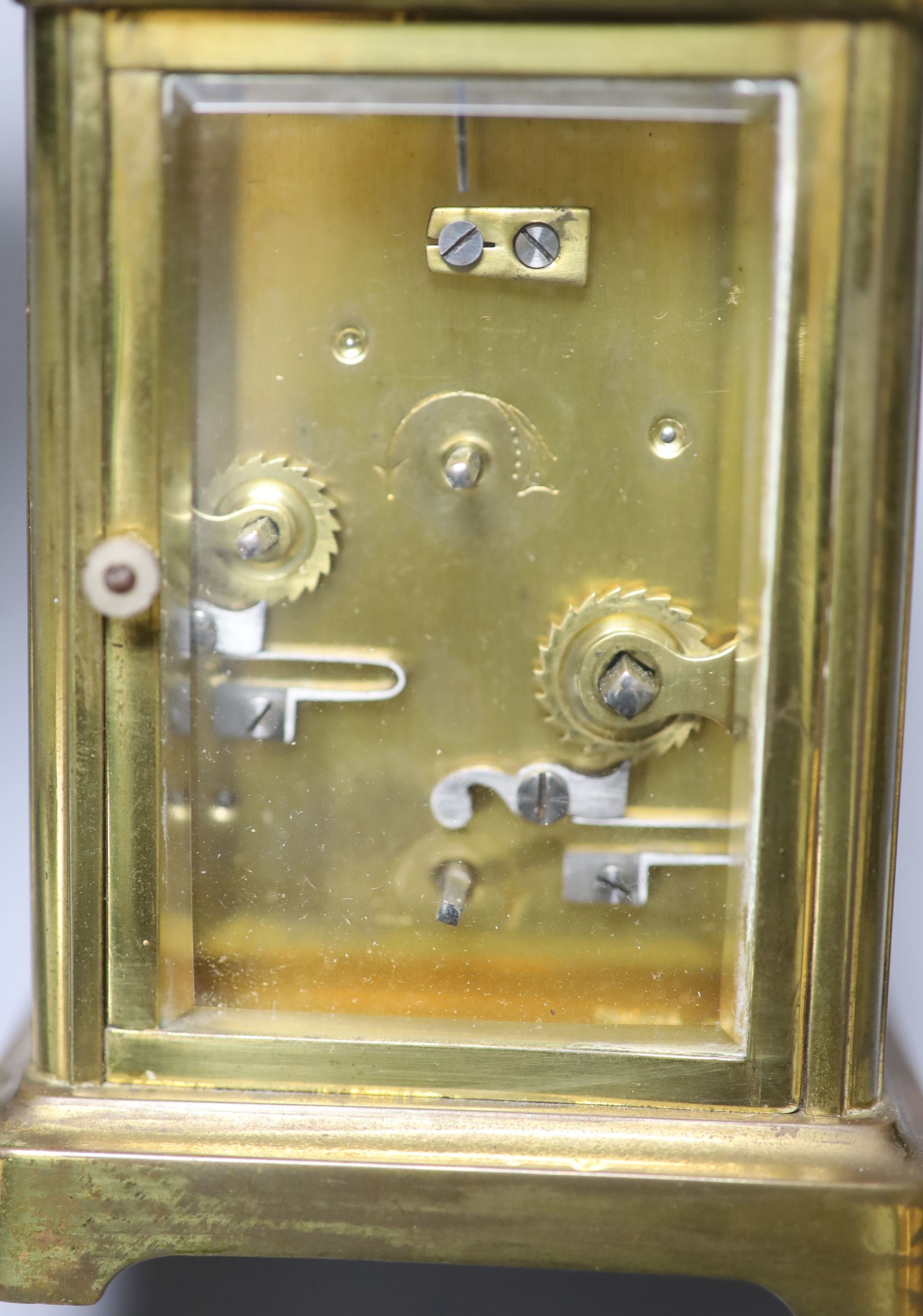 A late 19th century French brass cased eight day carriage timepiece with incorporated alarm, height 12cm